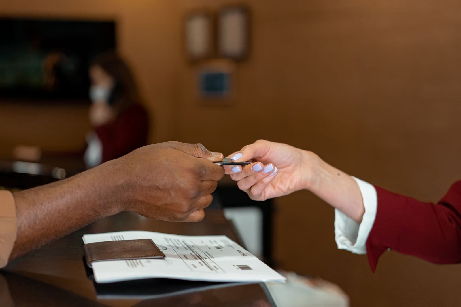 Reception desk with a guest list and papers for managing event RSVPs