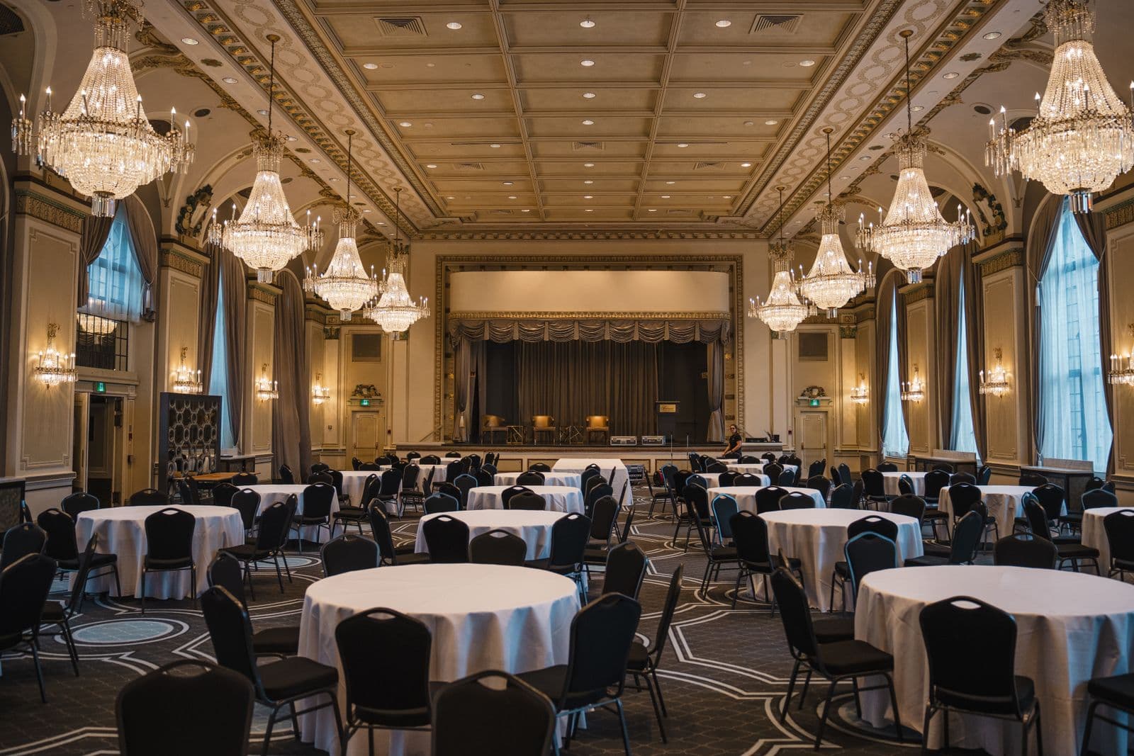 Empty elegant ballroom venue lit for an evening event